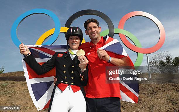 Charlotte Dujardin of Great Britain poses with her fiance, Dean Wyatt Golding after winning the gold medal during the Dressage Individual Grand Prix...
