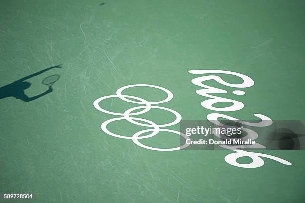 Summer Olympics: View of shadow of player serving during Spain Rafael Nadal vs Argentina Juan Martin Del Potro Men's Semifinal match at Olympic...