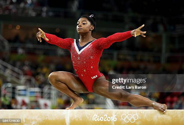 Simone Biles of the United States competes in the Balance Beam Final on day 10 of the Rio 2016 Olympic Games at Rio Olympic Arena on August 15, 2016...