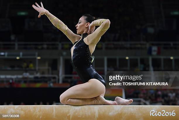 Romania's Catalina Ponor competes in the women's balance beam event final of the Artistic Gymnastics at the Olympic Arena during the Rio 2016 Olympic...