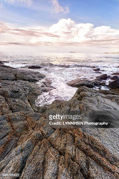 waves and tide - lynnhsin stock-fotos und bilder
