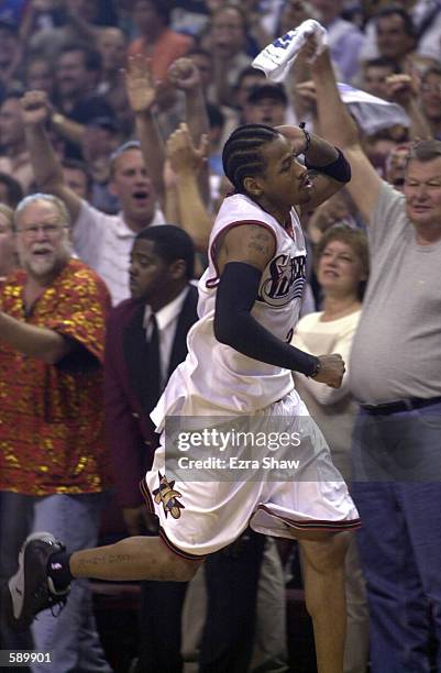 Allen Iverson of the Philadelphia 76ers gets the crowd fired-up during the closing moments of game seven in the eastern conference finals against the...