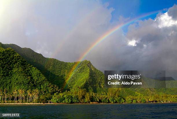 french polynesia, tahiti island, rainbow - tahiti stock pictures, royalty-free photos & images