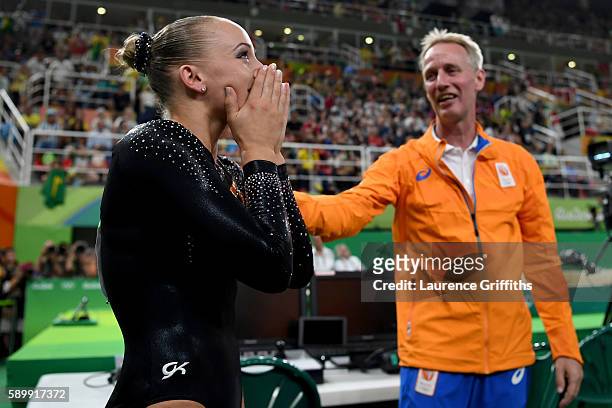 Sanne Wevers of the Netherlands celebrates winning the gold medal after the Balance Beam final on day 10 of the Rio 2016 Olympic Games at Rio Olympic...
