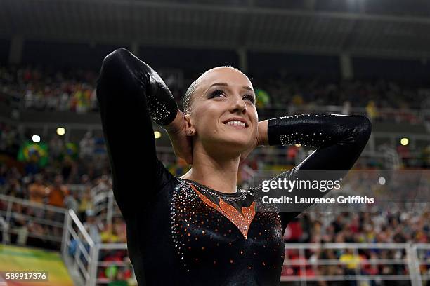 Sanne Wevers of the Netherlands celebrates winning the gold medal after the Balance Beam final on day 10 of the Rio 2016 Olympic Games at Rio Olympic...