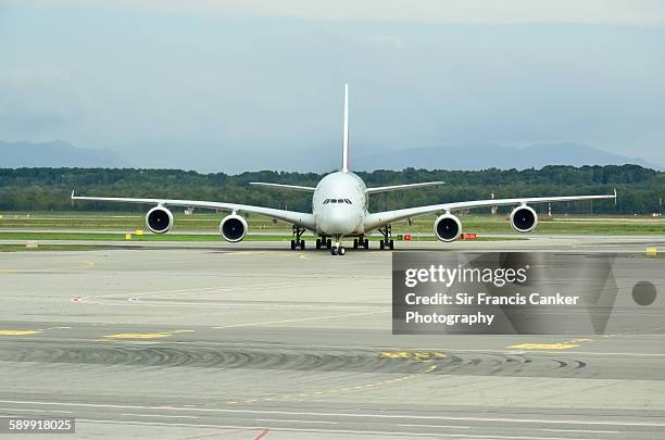 front, full length view of an airbus a380 - airbus a380 front stock pictures, royalty-free photos & images