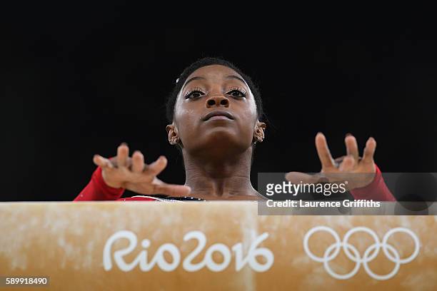 Simone Biles of the United States prepares to compete in the Balance Beam Final on day 10 of the Rio 2016 Olympic Games at Rio Olympic Arena on...