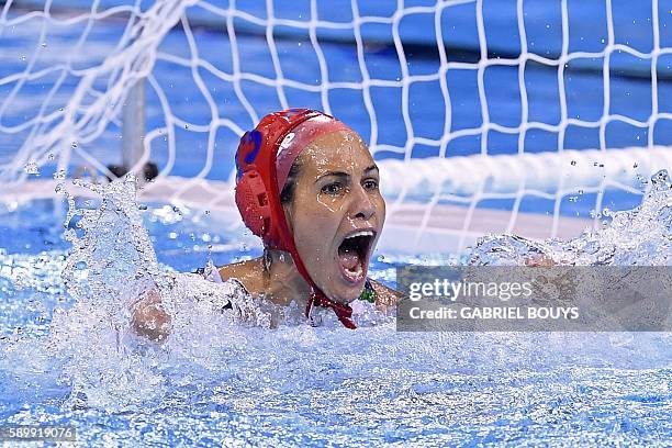 Hungary's goalie Orsolya Kaso celebrates after saving a goal during the Rio 2016 Olympic Games waterpolo qauerterfinal match against Australia at the...