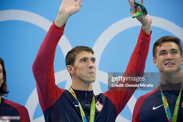 Summer Olympics: USA Michael Phelps victorious on medal stand after winning Gold during Men's 4x100M Medley Relay Final at Olympic Aquatics Centre....