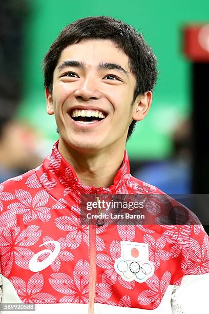 Kenzo Shirai of Japan celebrates winning the bronze medal in the Men's Vault on day 10 of the Rio 2016 Olympic Games at Rio Olympic Arena on August...