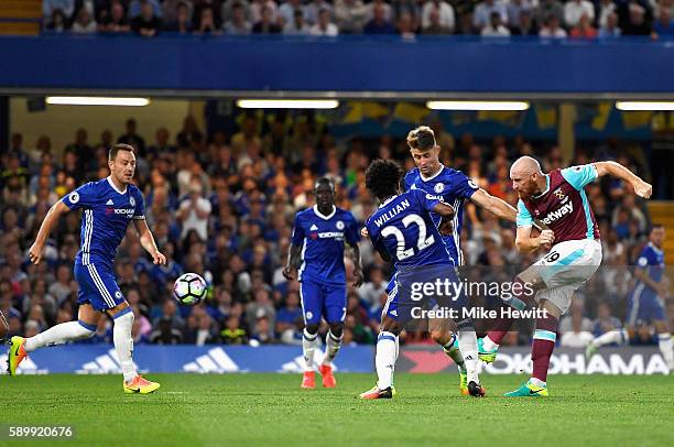 James Collins of West Ham United scores his team's opening goal during the Premier League match between Chelsea and West Ham United at Stamford...