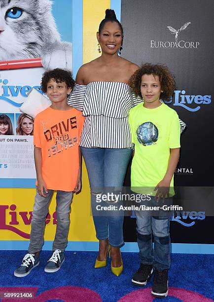 Actress Garcelle Beauvais and sons Jaid Thomas Nilon and Jax Joseph Nilon arrive at the premiere of EuropaCorp's 'Nine Lives' at TCL Chinese Theatre...