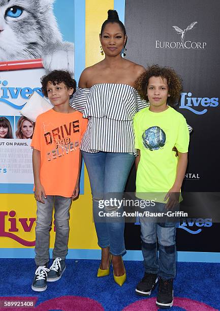 Actress Garcelle Beauvais and sons Jaid Thomas Nilon and Jax Joseph Nilon arrive at the premiere of EuropaCorp's 'Nine Lives' at TCL Chinese Theatre...