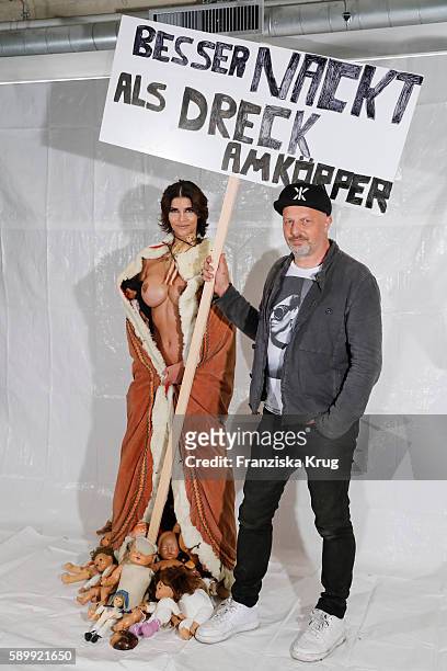 Michaela Schaefer and Kai Stuht pose during the Performance 'Babydoll Fashion by Micaela Schaefer' in Berlin on August 15, 2016 in Berlin, Germany.