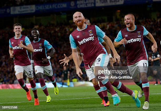 James Collins of West Ham United celebrates scoring an equalising goal during the Premier League match between Chelsea and West Ham United at...
