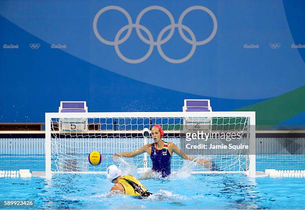 Bronwen Knox of Australia shoots against goalkeeper Orsolya Kaso of Hungary during a shootout in their Women's Water Polo quarterfinal match at the...