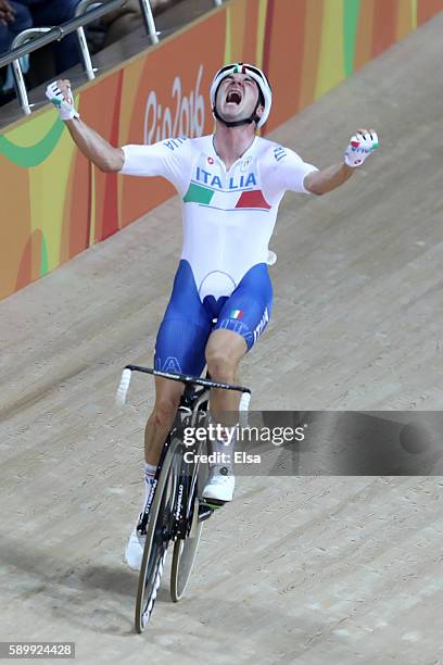 Elia Viviani of Italy celebrates after winning the Cycling Track Men's Omnium Points Race 6\6 on Day 10 of the Rio 2016 Olympic Games at the Rio...