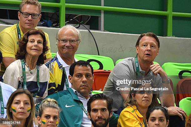 Queen Silvia of Sweden and King Carl Gustaf of Sweden and Swedish Olympic Committee President Hans Vestberg attend the Men's Preliminary Group B...