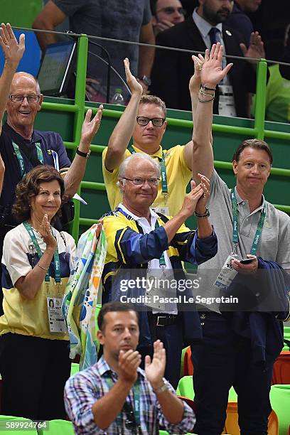 Queen Silvia of Sweden and King Carl Gustaf of Sweden and Swedish Olympic Committee President Hans Vestberg attend the Men's Preliminary Group B...