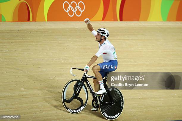 Elia Viviani of Italy celebrates after winning the Cycling Track Men's Omnium Points Race 6\6 on Day 10 of the Rio 2016 Olympic Games at the Rio...