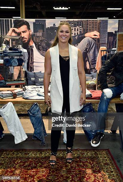 Buffalo David Bitton Brand Ambassador Ronda Rousey attends the Buffalo David Bitton booth during Project Vegas at the Mandalay Bay Convention Center...