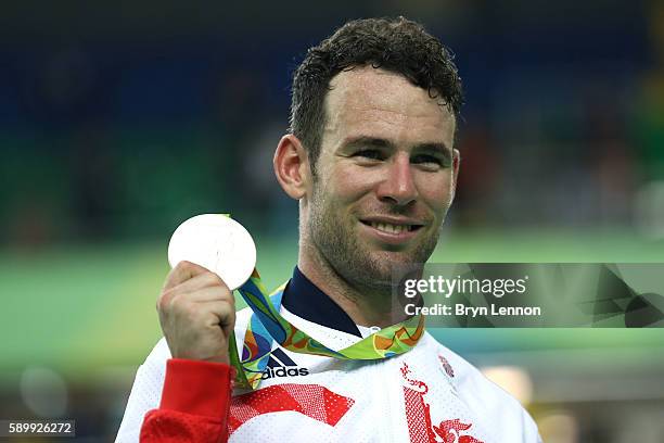 Silver medalist Mark Cavendish of Great Britain celebrates on the podium during the medal ceremony for the Cycling Track Men's Omnium Points Race 6\6...