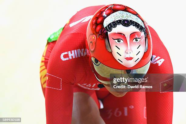 Tianshi Zhong of China competes against Anastasiia Voinova of Russia during the Cycling Track Women's Sprint 1/8 Finals on Day 10 of the Rio 2016...