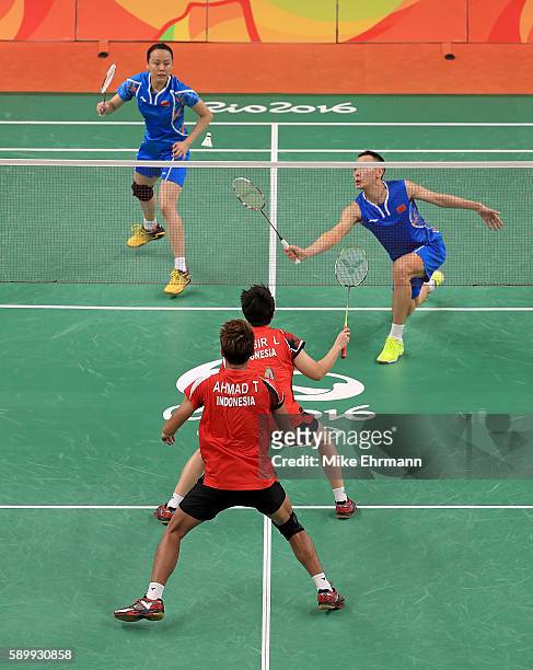 Tontowi Ahmad and Lilyana Natsir of Indonesia play a Mixed Doubles Semifinal match against Nan Zhang and Yunlei Zhao of China on Day 10 of the 2016...