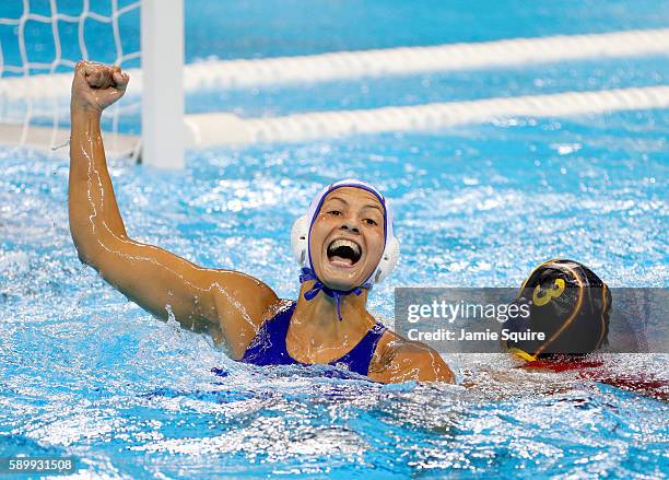 Ekaterina Prokofyeva of Russia celebrates after scoring a goal during the Women's Water Polo quarterfinal match at the Rio 2016 Olympic Games on...