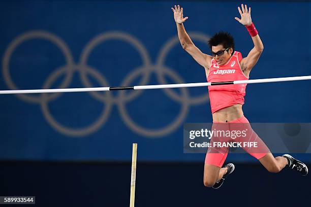 Japan's Daichi Sawano competes in the Men's Pole Vault Final during the athletics event at the Rio 2016 Olympic Games at the Olympic Stadium in Rio...