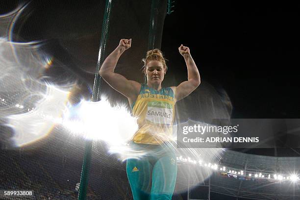 Australia's Dani Samuels reacts as she competes in the Women's Discus Throw Qualifying Round during the athletics competition at the Rio 2016 Olympic...