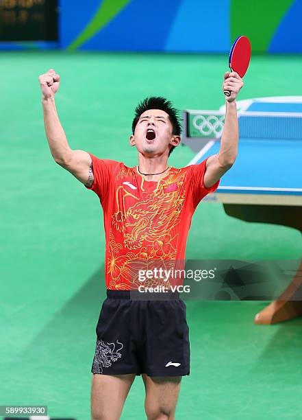 Zhang Jike of China celebrates in a match against Youngsik Jeoung of Korea during the Table Tennis Men's Team Semifinal on Day 10 of the Rio 2016...