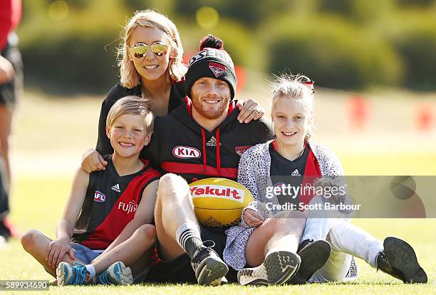 Adam Cooney of the Bombers poses with his wife Haylea and children Ashlea Cooney and Jaxon Cooney during a Essendon Bombers AFL media opportunity at...