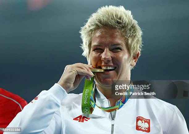 Gold medalist Anita Wlodarczyk of Poland poses on the podium during the medal ceremony for the Womens Hammer Throw on Day 10 of the Rio 2016 Olympic...