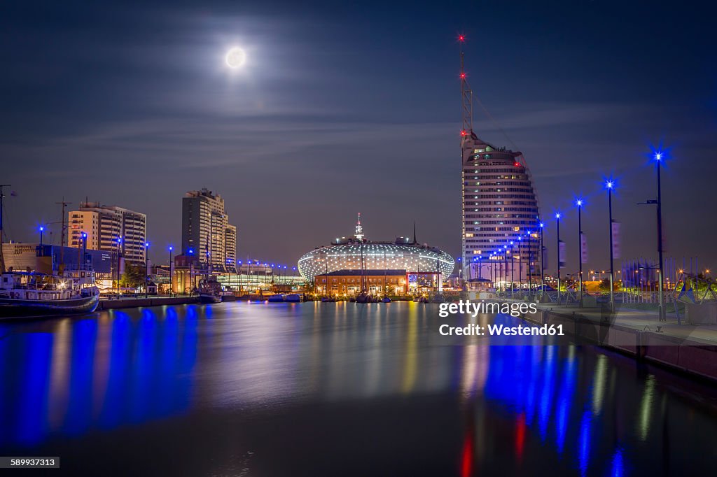 Germany, Bremerhaven, Klimahaus and Atlantic Hotel Sail City at night
