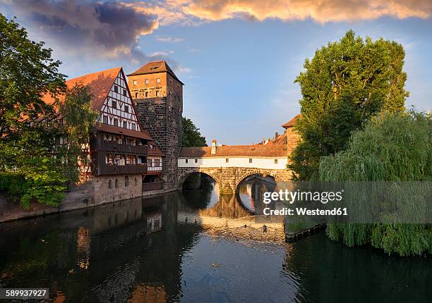 germany, nuremberg, wine bar and water tower at pegnitz river - nuremberg stock-fotos und bilder