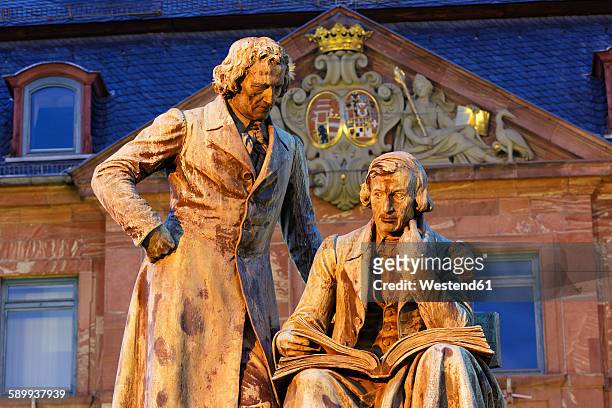 germany, hesse, hanau, brothers grimm monument in front of neustadt town hall - hanau stock pictures, royalty-free photos & images