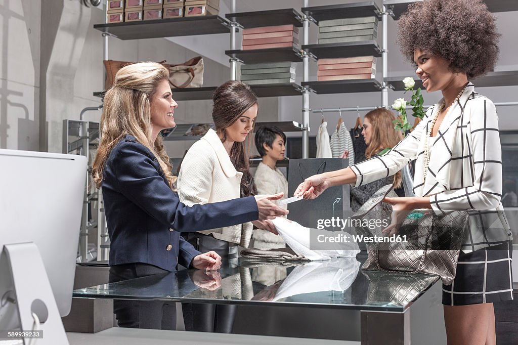 Woman shopping in luxury boutique