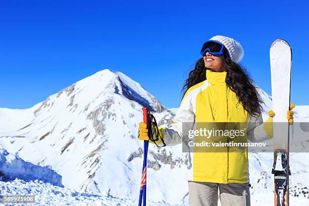 female skier in snow mountain - bansko stockfoto's en -beelden