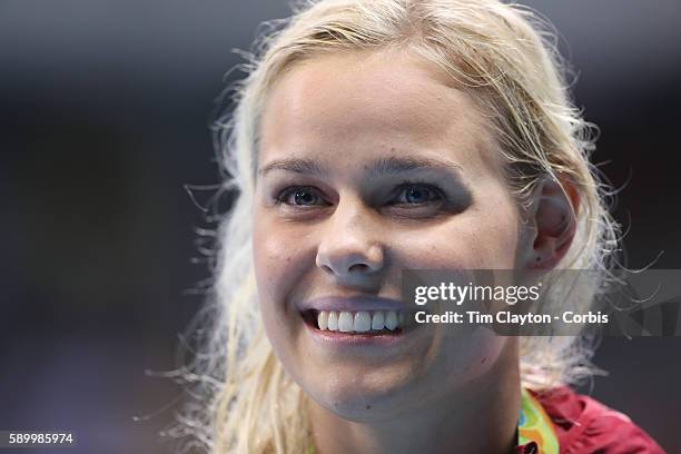 Day 8 Pernille Blume of Denmark at the medal presentation after winning the Women's 50m Freestyle Final during the swimming competition at the...