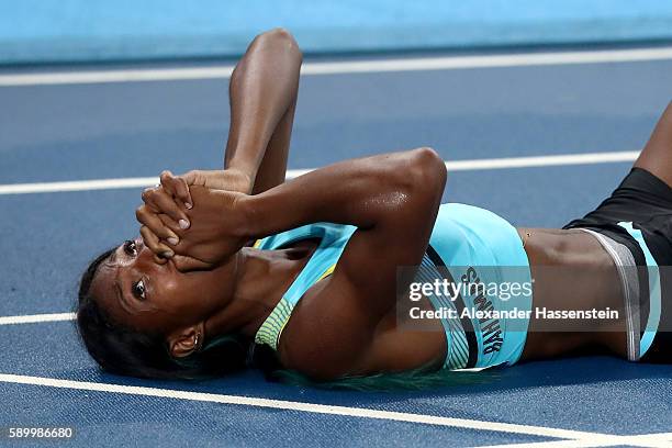 Shaunae Miller of the Bahamas reacts after winning the gold medal in the Women's 400m Final on Day 10 of the Rio 2016 Olympic Games at the Olympic...