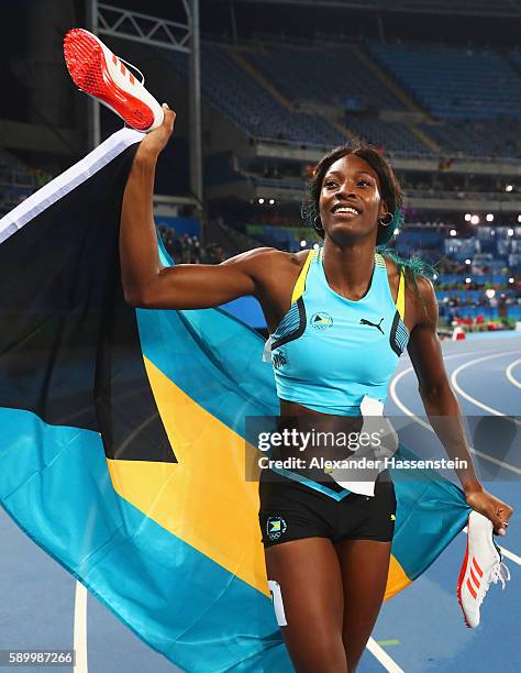 Shaunae Miller of the Bahamas reacts after winning the gold medal in the Women's 400m Final on Day 10 of the Rio 2016 Olympic Games at the Olympic...