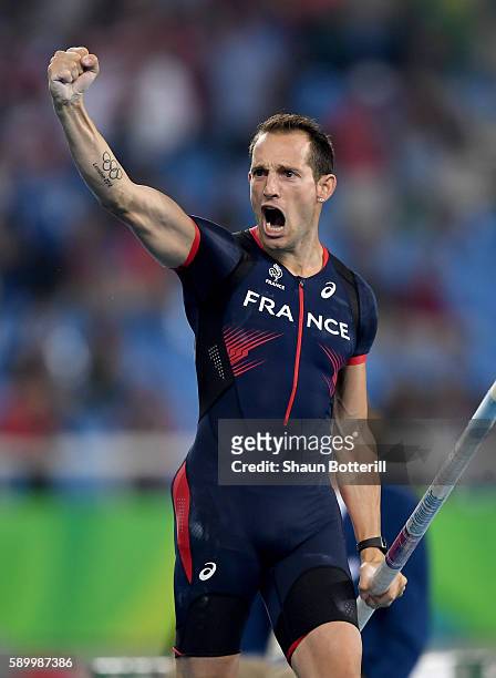 Renaud Lavillenie of France reacts while competing in the Men's Pole Vault final on Day 10 of the Rio 2016 Olympic Games at the Olympic Stadium on...