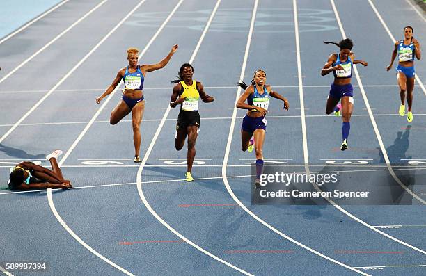 Shaunae Miller of the Bahamas wins the gold medal in the Women's 400m Final ahead of silver medalist Allyson Felix of the United States and bronze...