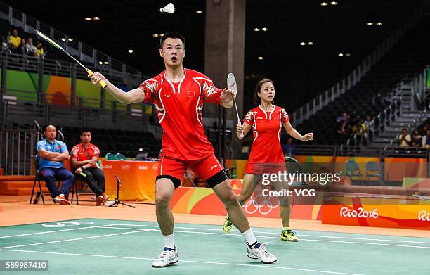 Ma Jin and Xu Chen of China compete during Badminton Mixed Doubles Quarter Final match against Ha Na Kim and Hyun Sung Ko of Korea on Day 9 of the...