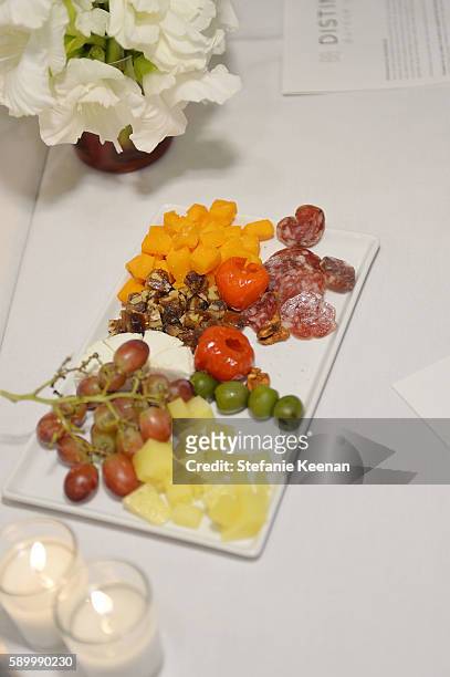 Dinner on display at Andy Lu, Lauri Firstenberg and James Deutsch host Distinct Daily's Inaugural Los Angeles Salon Series at Lombardi House on...
