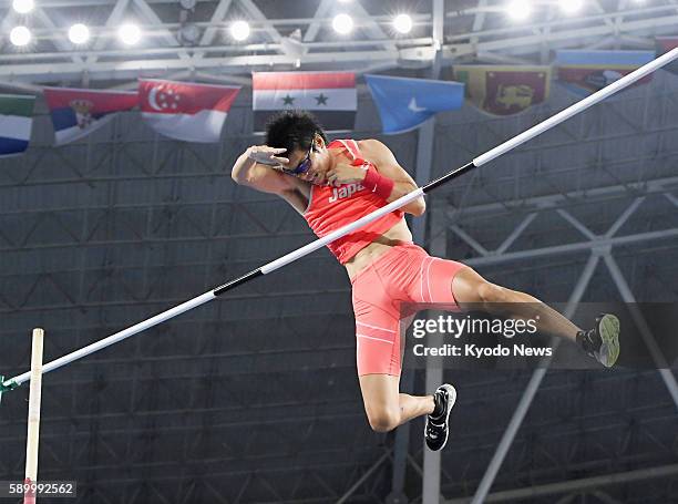 Japan's Daichi Sawano makes an unsuccessful attempt to clear 5.65 meters during the men's pole vault final at the Rio de Janeiro Olympics on Aug. 15,...