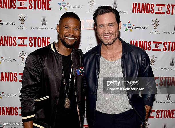 Actor/singer Usher Raymond and actor Edgar Ramirez arrive at the Pandora Summer Crush at L.A. Live on August 13, 2016 in Los Angeles, California.