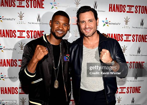 Actor/singer Usher Raymond and actor Edgar Ramirez arrive at the Pandora Summer Crush at L.A. Live on August 13, 2016 in Los Angeles, California.