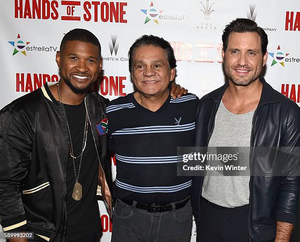 Actor/singer Usher Raymond, former professional boxer Roberto Duran, and actor Edgar Ramirez arrive at a screening of the Weinstein Company's "Hands...